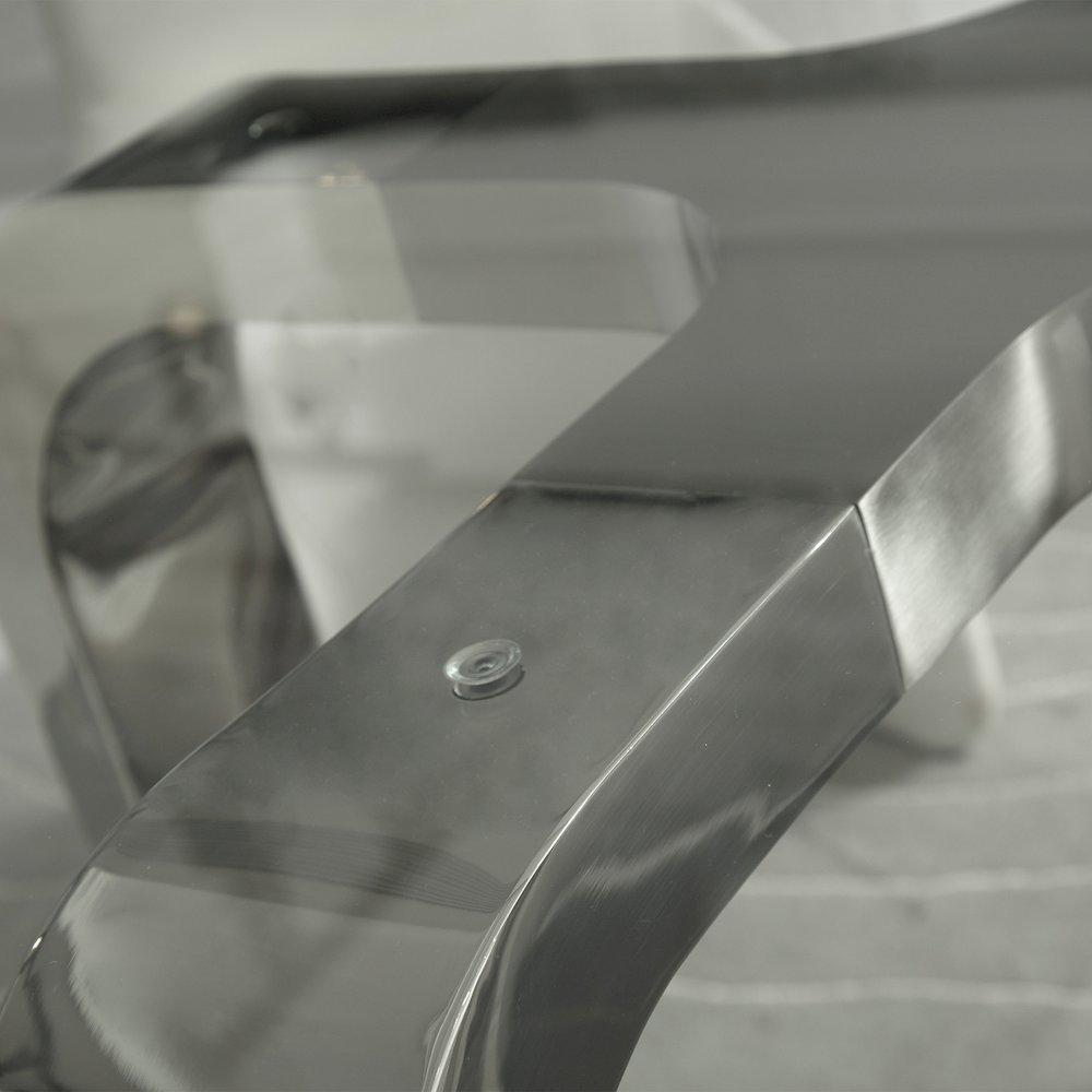 Designer Louis Lara's Cirrus table has polished base connector with brushed stainless steel and 15mm Tempered glass Top Smoke. Picture 2