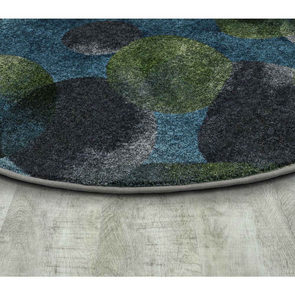 Riverstone 7'8" x 10'9" area rug in color Teal. Picture 2