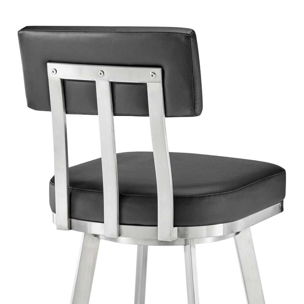 Jinab Swivel Bar Stool in Brushed Stainless Steel with Black Faux Leather. Picture 6