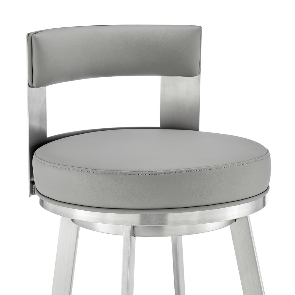 Lynof Swivel Bar Stool in Brushed Stainless Steel with Light Grey Faux Leather. Picture 5