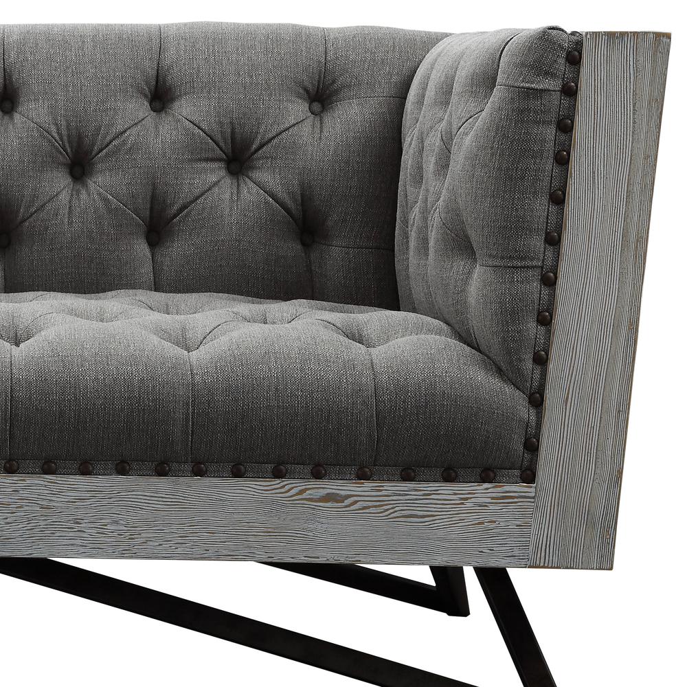 Regis Contemporary Loveseat in Grey Fabric with Black Metal Finish Legs and Antique Brown Nailhead Accents. Picture 2