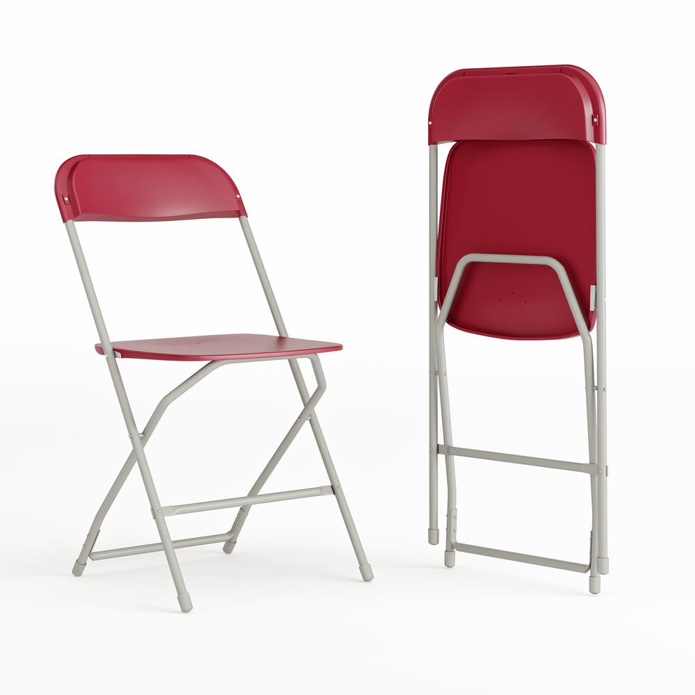 Set of 2 Commercial Grade Red Plastic Folding Chairs. Picture 1