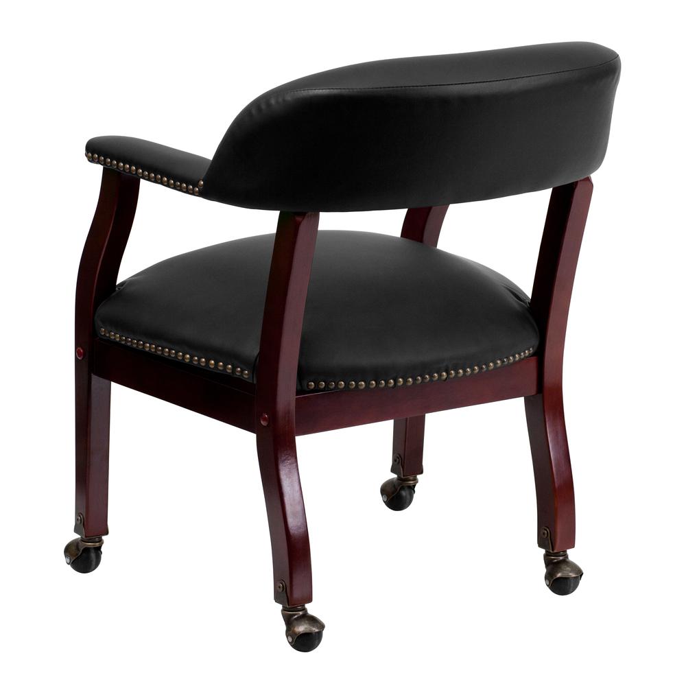 Black LeatherSoft Conference Chair with Accent Nail Trim and Casters. Picture 4