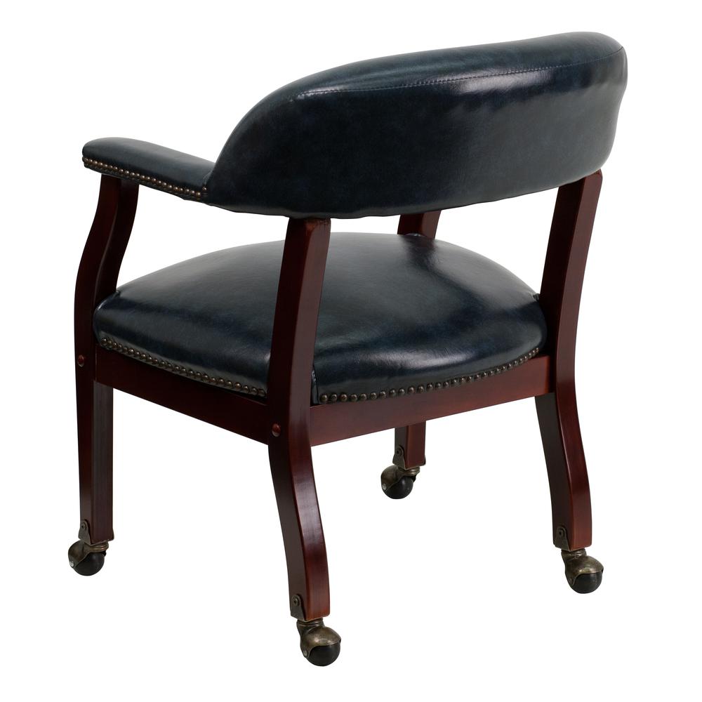Navy Vinyl Luxurious Conference Chair with Accent Nail Trim and Casters. Picture 4