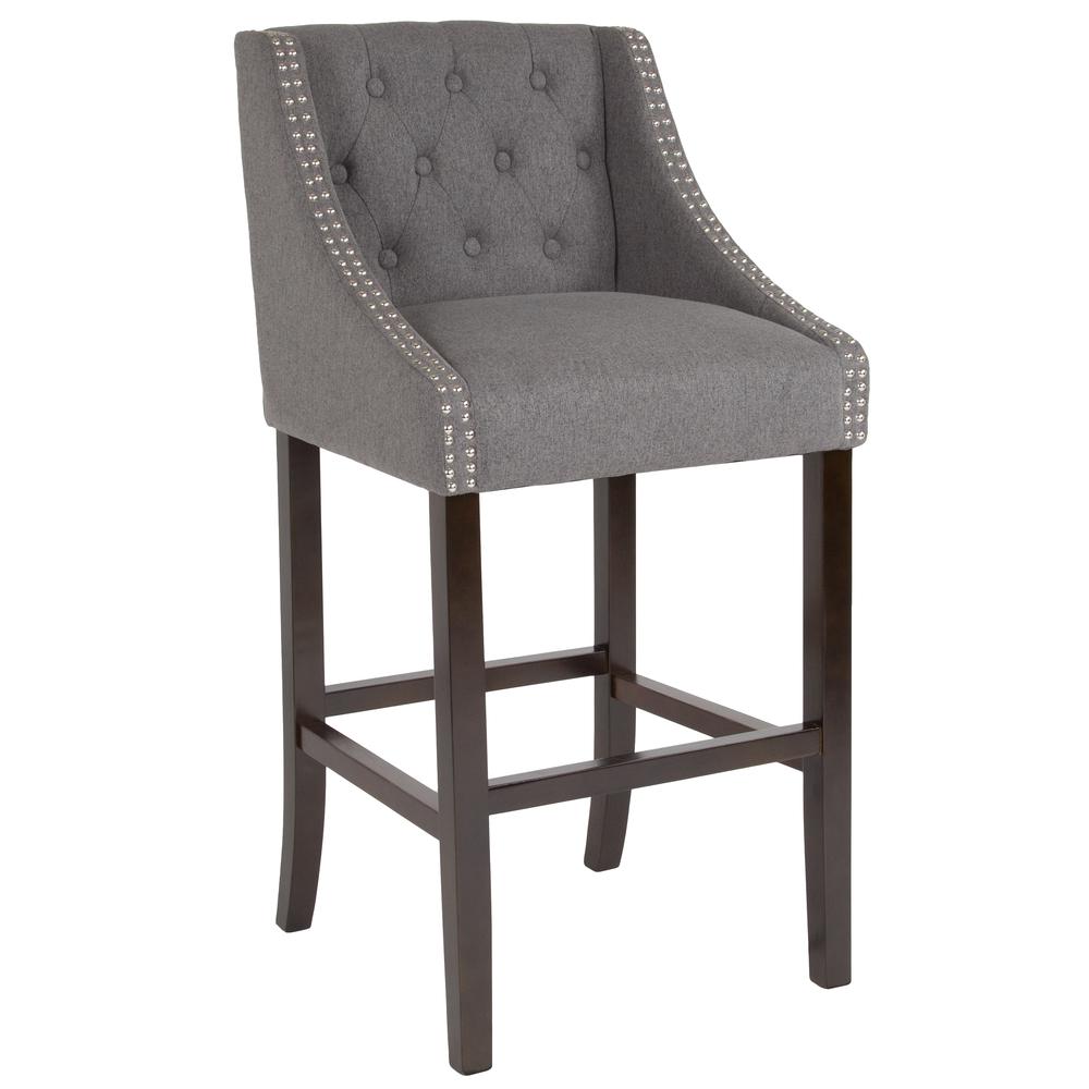 30" High Transitional Tufted Walnut Barstool with Accent Nail Trim in Dark Gray Fabric. The main picture.