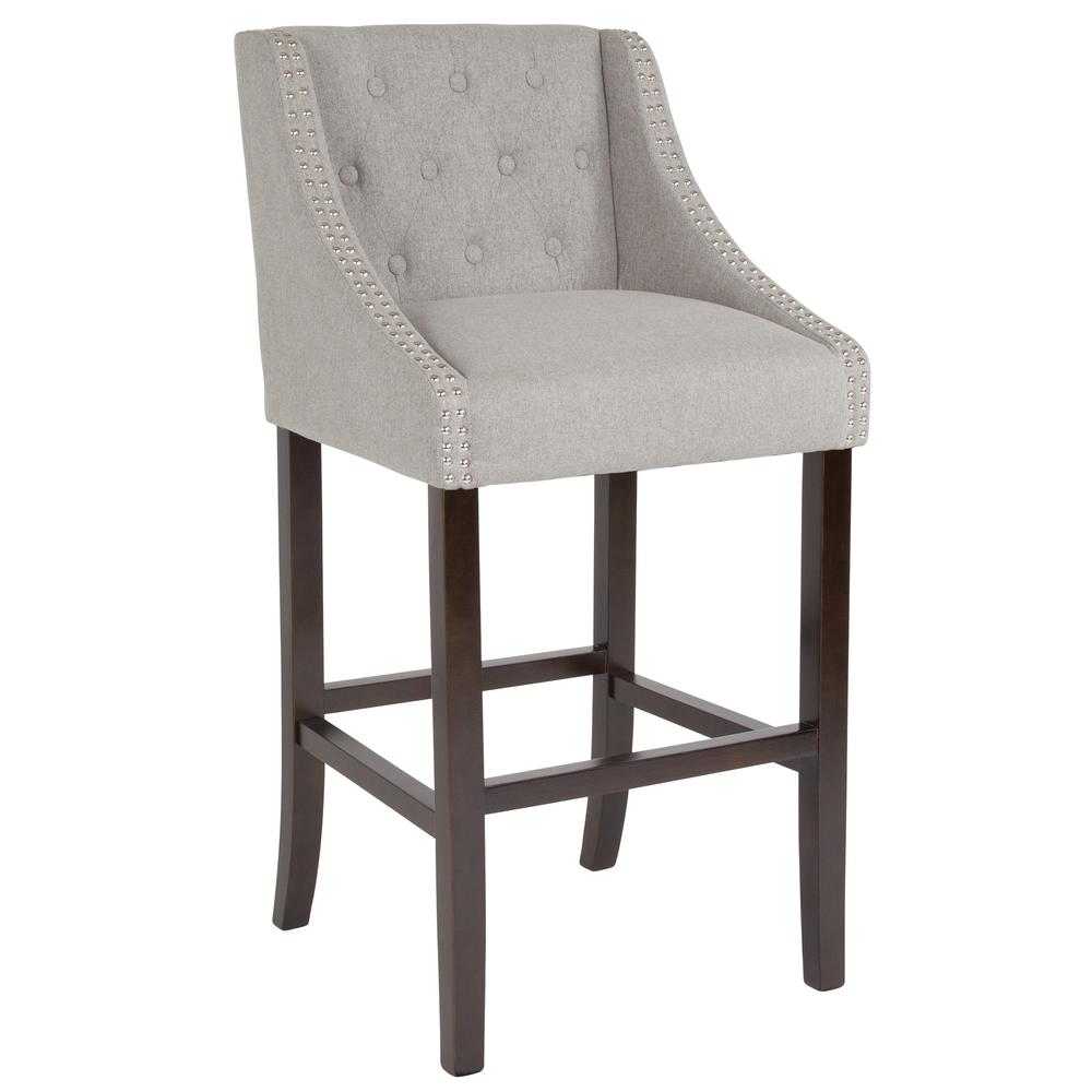 30" High Transitional Tufted Walnut Barstool with Accent Nail Trim in Light Gray Fabric. The main picture.