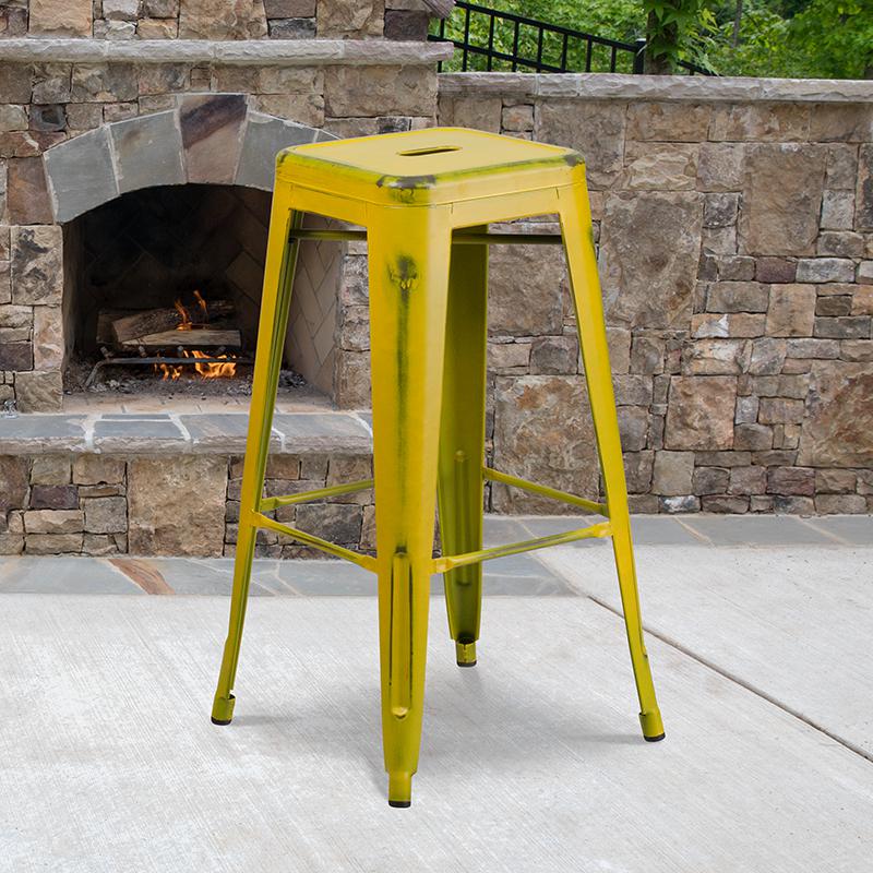 30" High Backless Distressed Yellow Metal Indoor-Outdoor Barstool. Picture 1