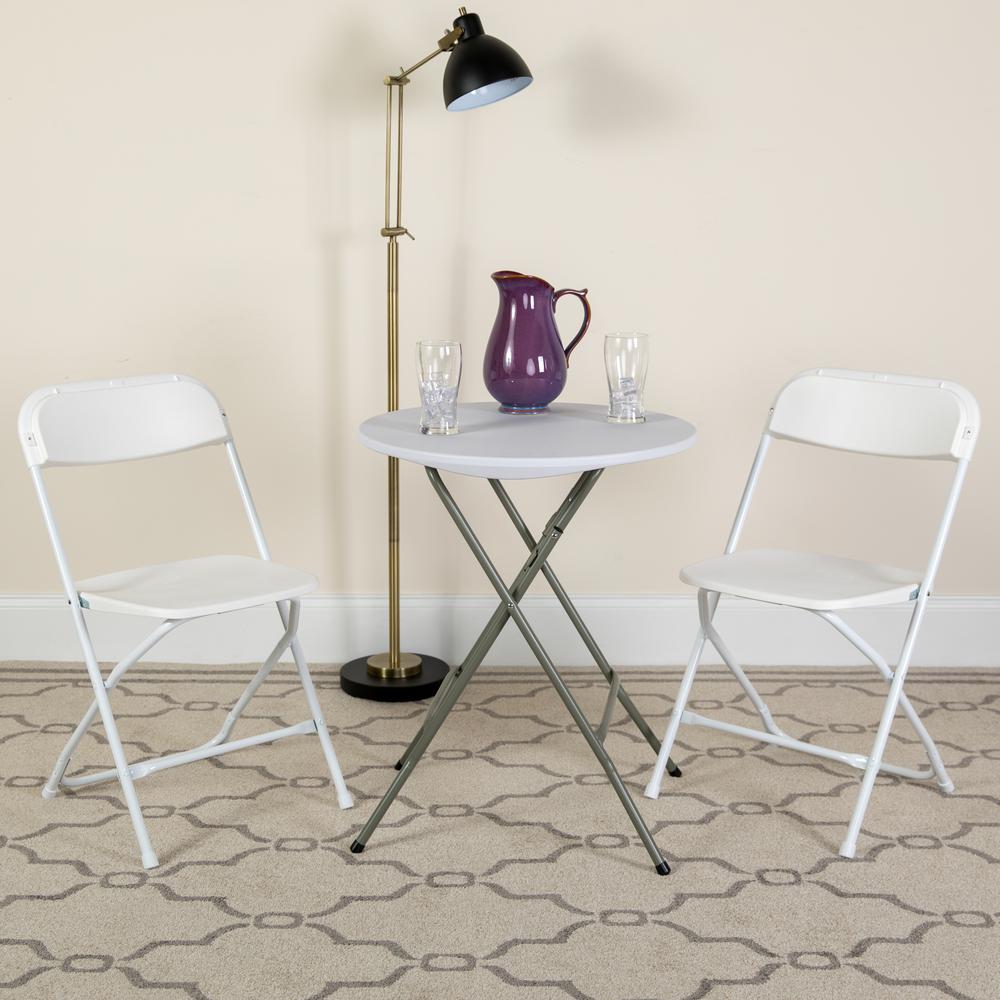 HERCULES Series 650 lb. Capacity Premium White Plastic Folding Chair. Picture 5