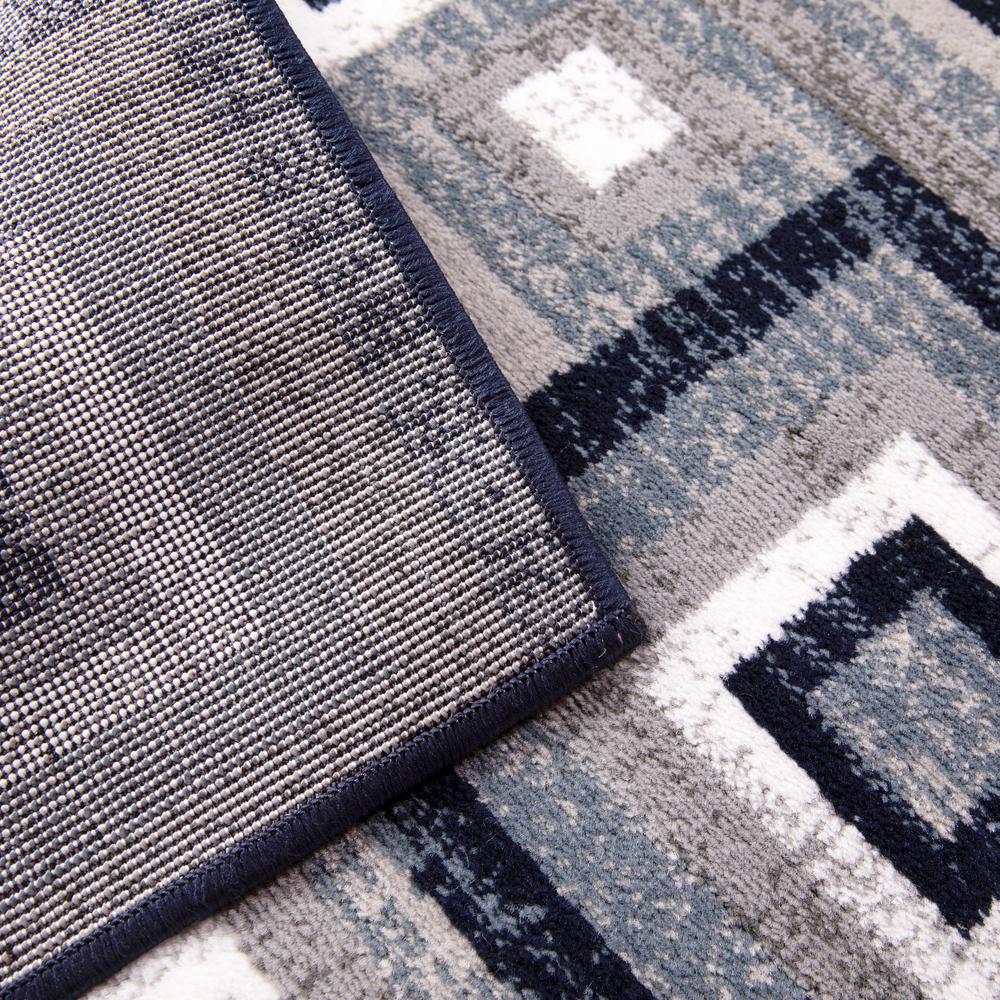 Geometric 5' x 7' Blue, Grey, and White Olefin Area Rug with Cotton Backing. Picture 9