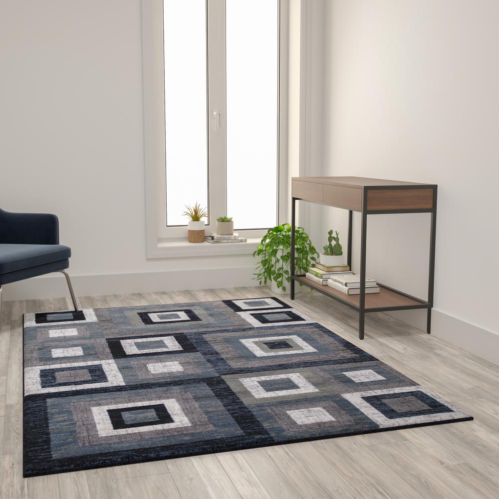 Geometric 5' x 7' Blue, Grey, and White Olefin Area Rug with Cotton Backing. Picture 1