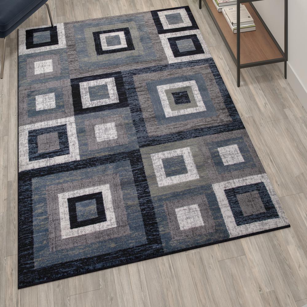Geometric 5' x 7' Blue, Grey, and White Olefin Area Rug with Cotton Backing. Picture 6