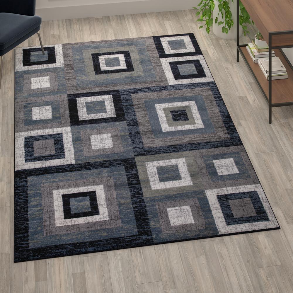 Geometric 6' x 9' Blue, Grey, and White Olefin Area Rug with Cotton Backing. Picture 1