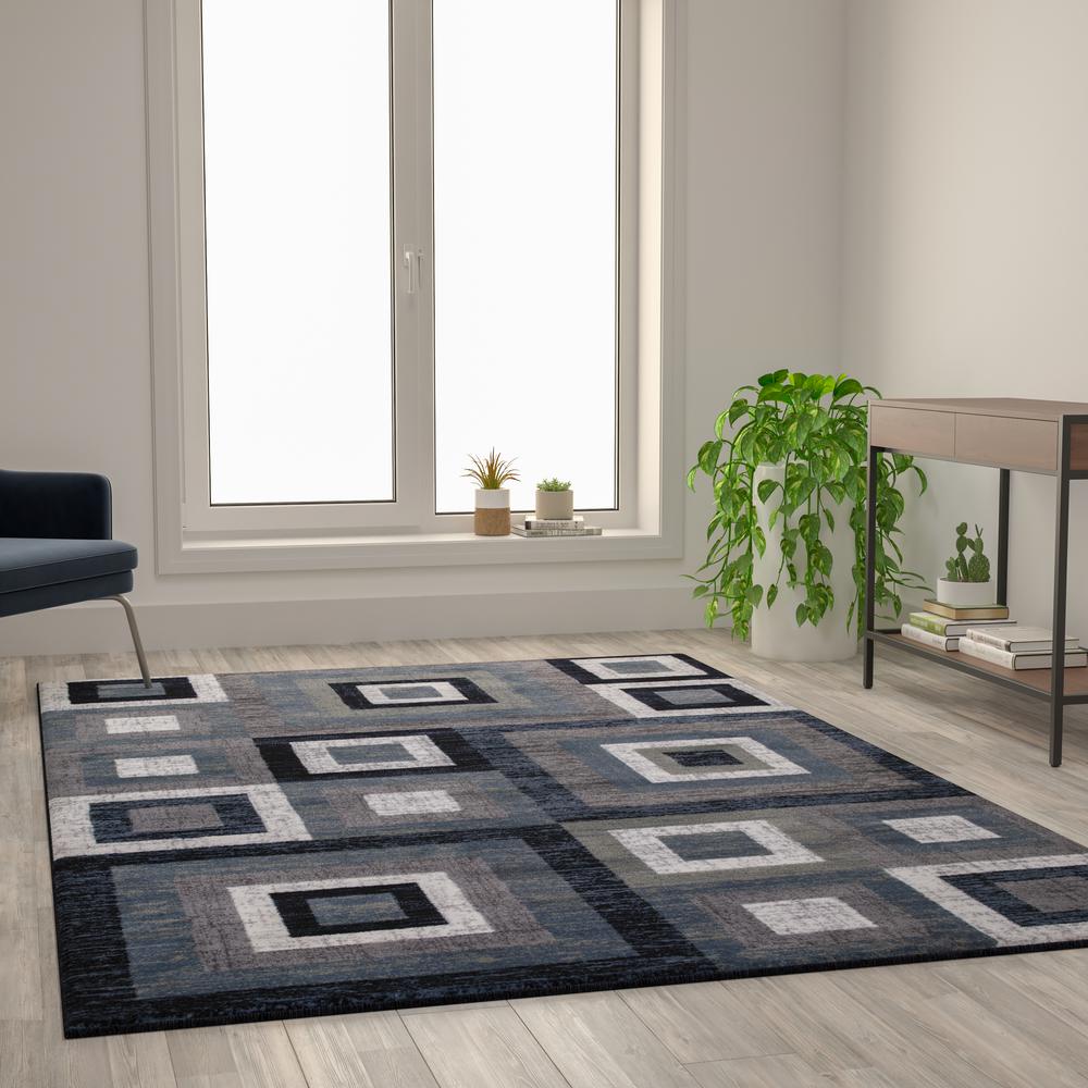 Geometric 6' x 9' Blue, Grey, and White Olefin Area Rug with Cotton Backing. Picture 6