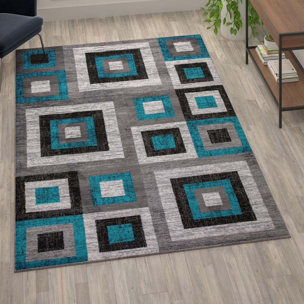 Geometric 6' x 9' Turquoise, Grey, and White Olefin Area Rug with Cotton Backing. Picture 10