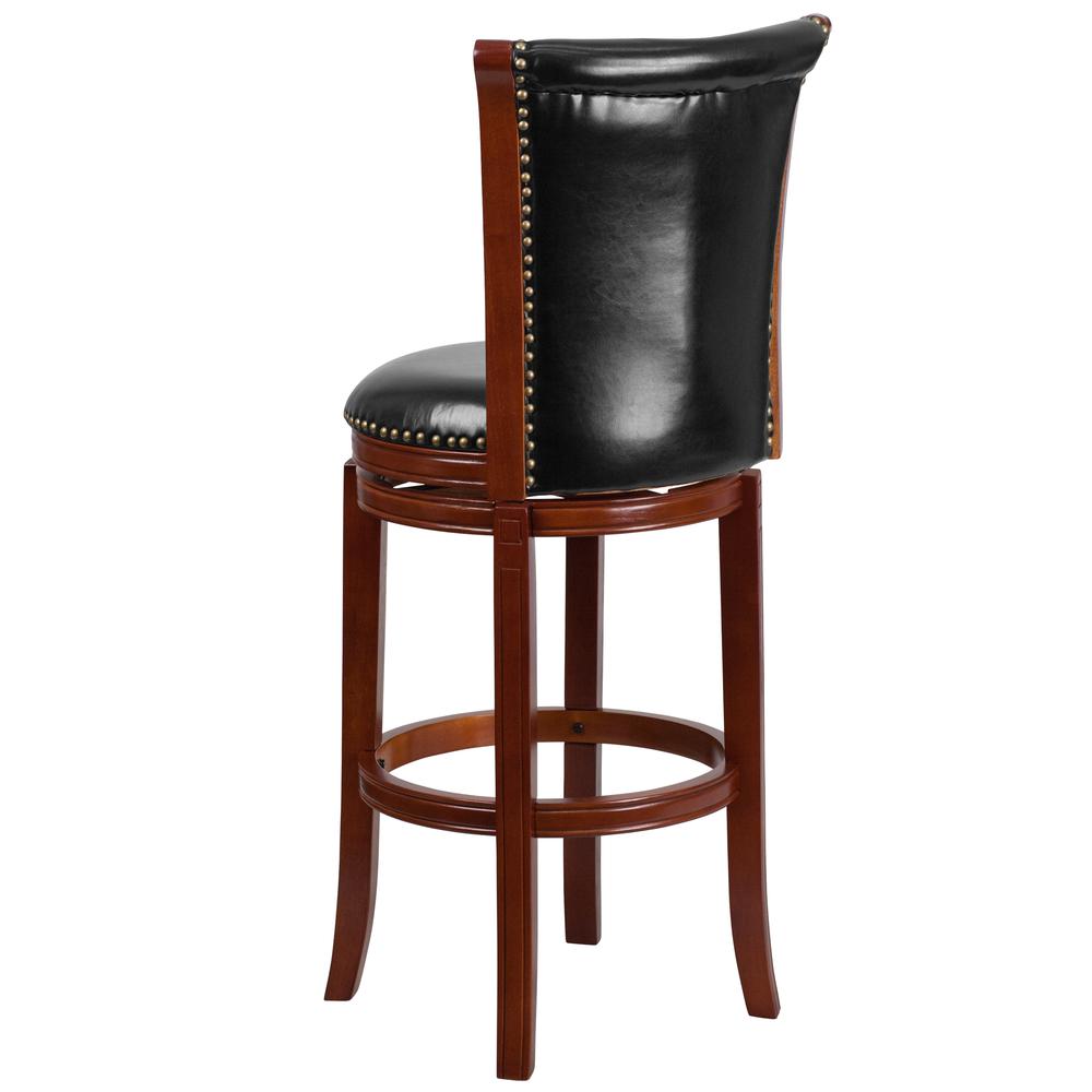 30'' High Dark Chestnut Wood Barstool with Panel Back and Black LeatherSoft Swivel Seat. Picture 3
