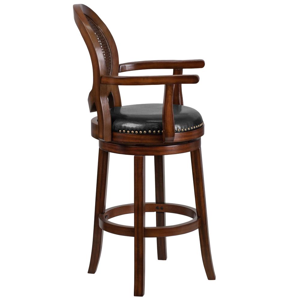 30'' High Expresso Wood Barstool with Arms, Woven Rattan Back and Black LeatherSoft Swivel Seat. Picture 2