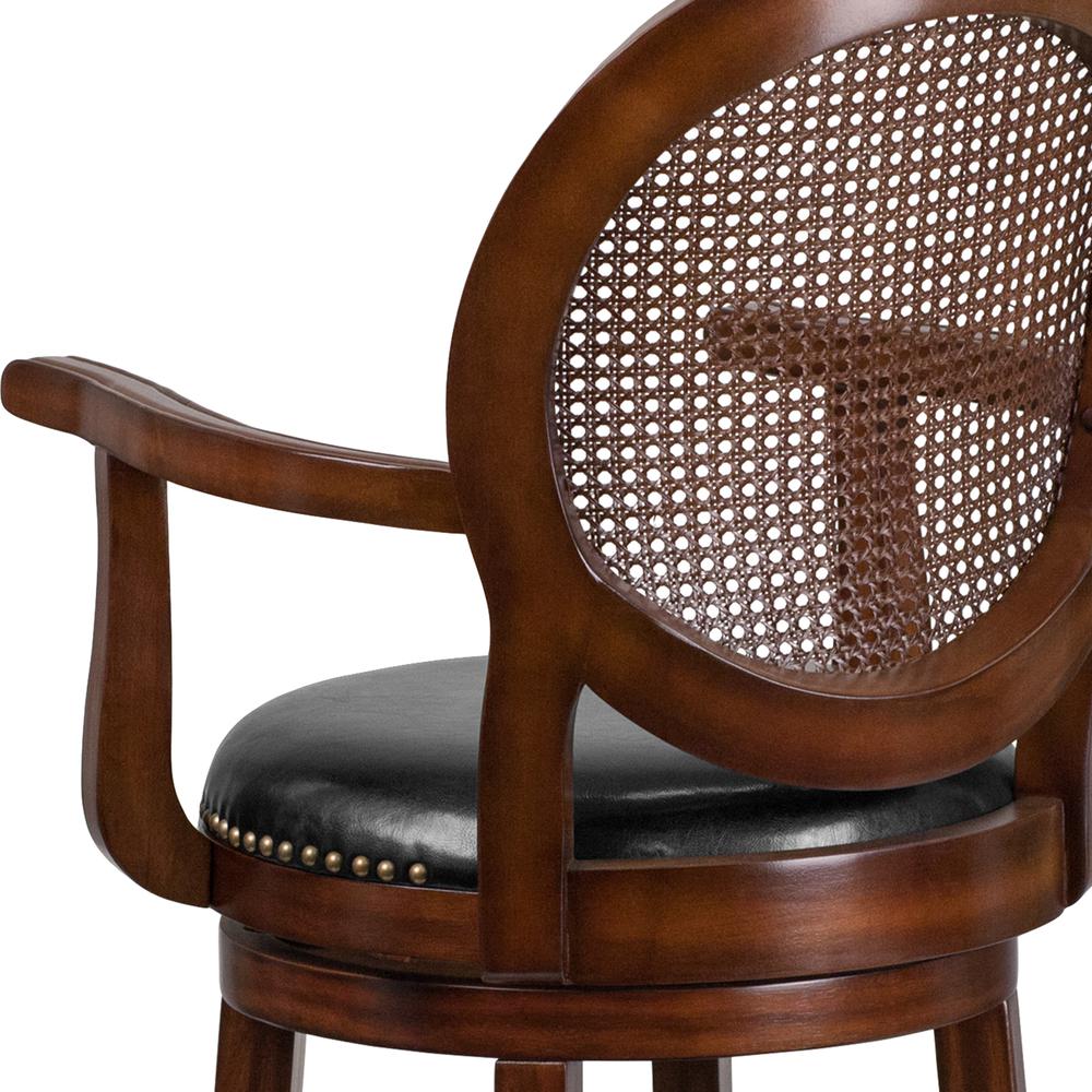 30'' High Expresso Wood Barstool with Arms, Woven Rattan Back and Black LeatherSoft Swivel Seat. Picture 6