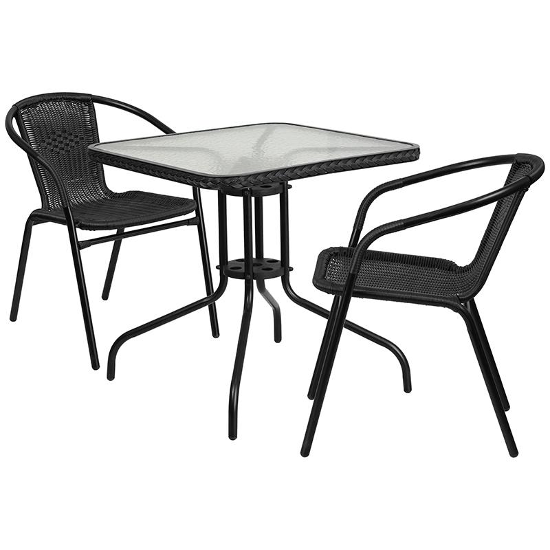 28'' Square Glass Metal Table with Black Rattan Edging and 2 Black Rattan Stack Chairs. Picture 1