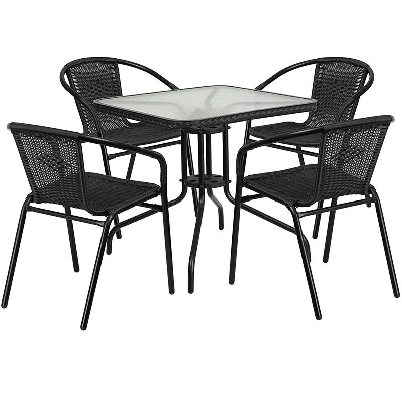 28'' Glass Metal Table with Black Rattan Edging and 4 Black Rattan Stack Chairs. Picture 2