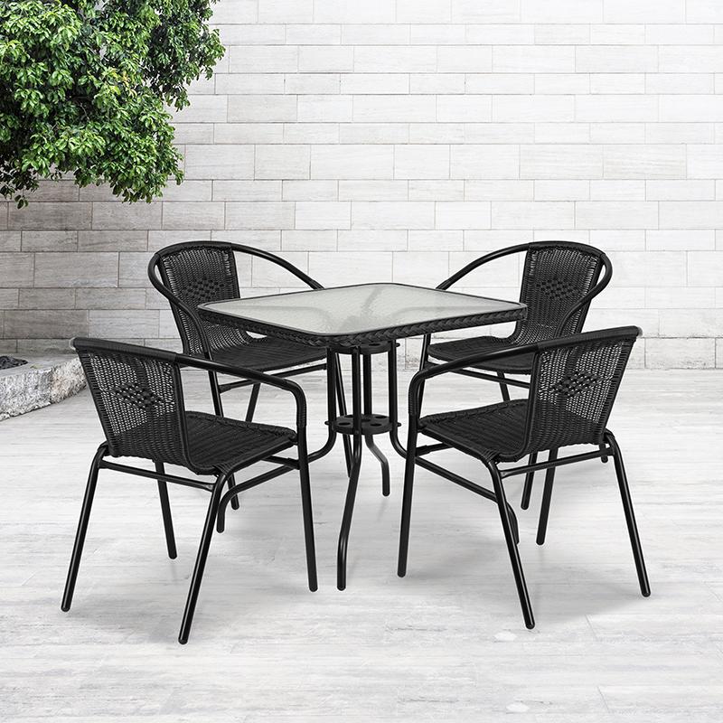 28'' Square Glass Metal Table with Black Rattan Edging and 4 Black Rattan Stack Chairs. Picture 4