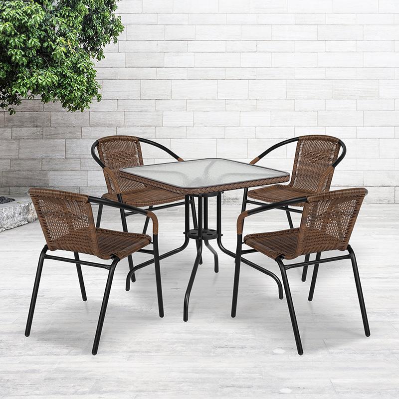28'' Square Glass Metal Table with Dark Brown Rattan Edging and 4 Dark Brown Rattan Stack Chairs. Picture 4