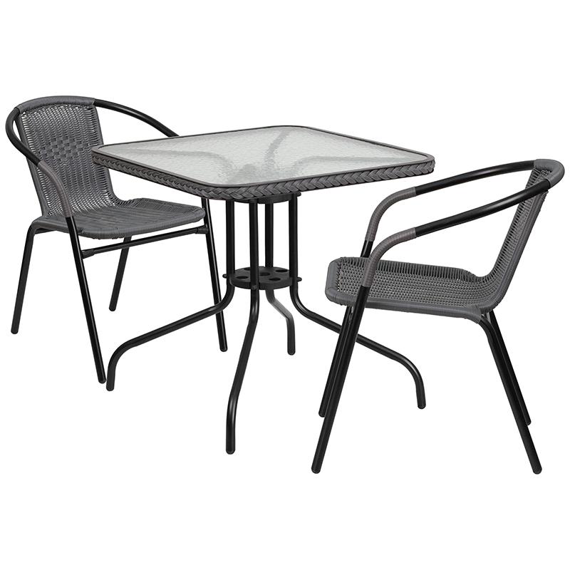 28'' Square Glass Metal Table with Gray Rattan Edging and 2 Gray Rattan Stack Chairs. Picture 1