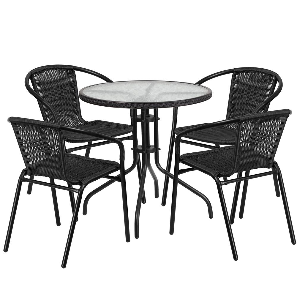 28'' Round Glass Metal Table with Black Rattan Edging and 4 Black Rattan Stack Chairs. The main picture.