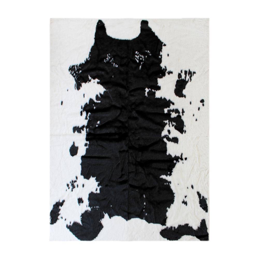 Modern 3' x 5' Faux Cowhide Print  Area Rug for Indoor Use. Picture 1