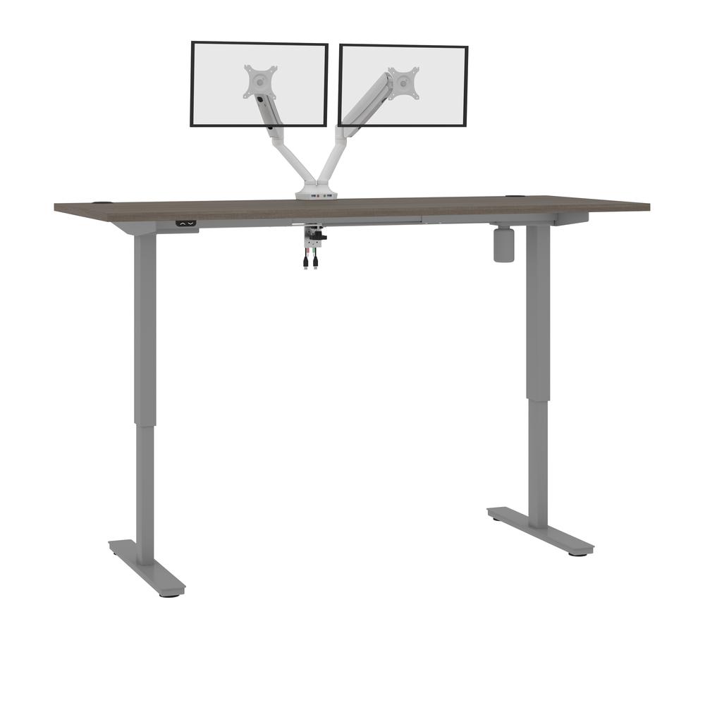 Bestar Upstand 72W x 30D Standing Desk with Dual Monitor Arm in bark grey. Picture 1