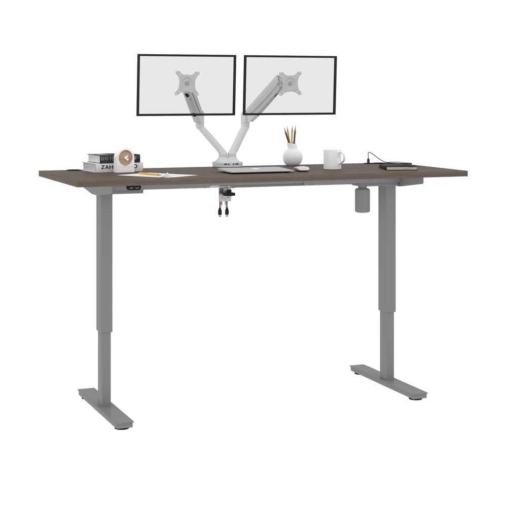 Bestar Upstand 72W x 30D Standing Desk with Dual Monitor Arm in bark grey. Picture 5