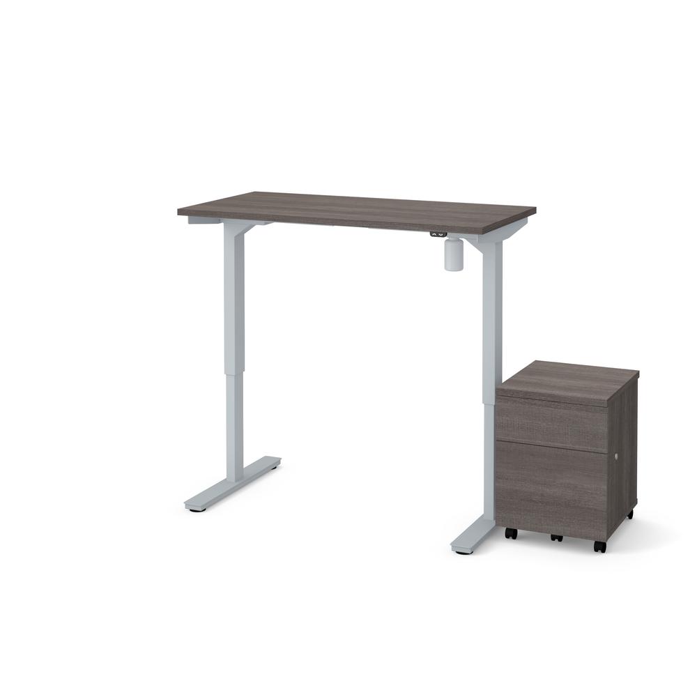 Bestar 2-Piece 24" x 48" Electric Height adjustable table and Mobile filing cabinet in Bark Gray. Picture 2