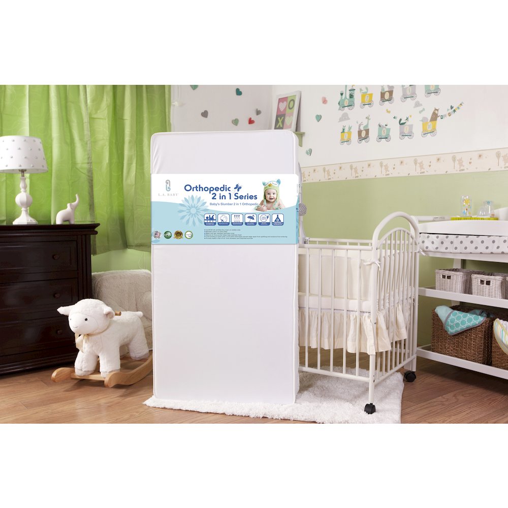 2-in-1 Orthopedic Dual Sided Premier Waterproof Crib & Toddler Mattress with Memory Foam Layer. Picture 3