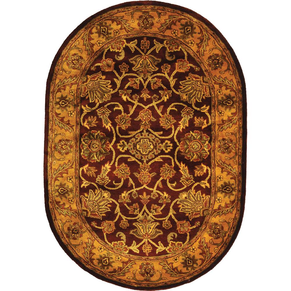 GOLDEN JAIPUR, BURGUNDY / GOLD, 4'-6" X 6'-6" Oval, Area Rug. Picture 1