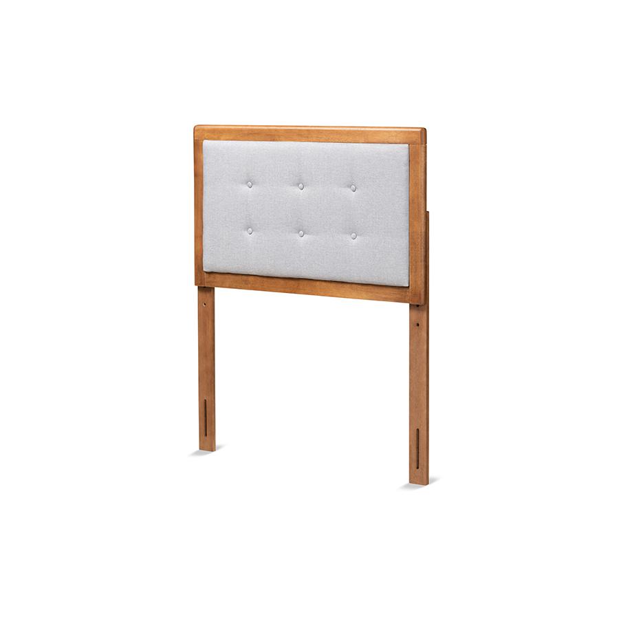 Sarine Mid-Century Modern Light Grey Fabric Upholstered and Walnut Brown Finished Wood Twin Size Headboard. The main picture.