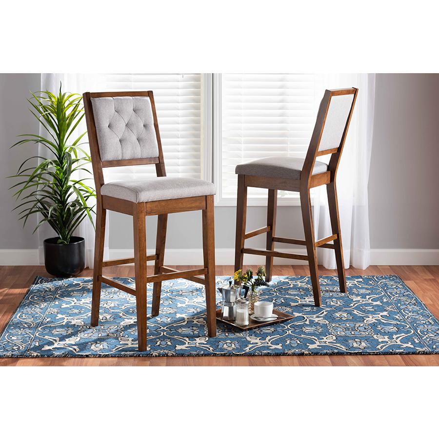 Baxton Studio Gideon Modern and Contemporary Grey Fabric Upholstered and Walnut Brown Finished Wood 2-Piece Bar Stool Set. Picture 1