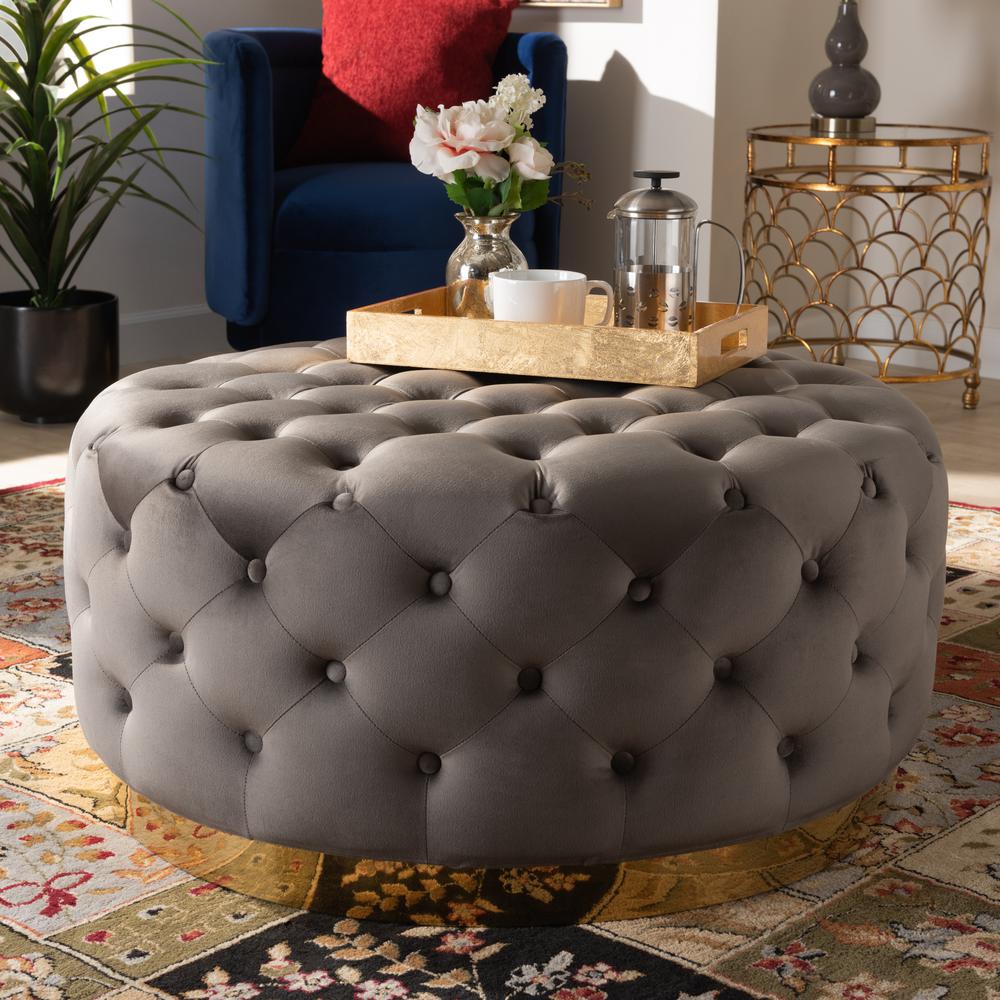 Luxe Grey Velvet Fabric Upholstered Gold Finished Round Cocktail Ottoman. Picture 10