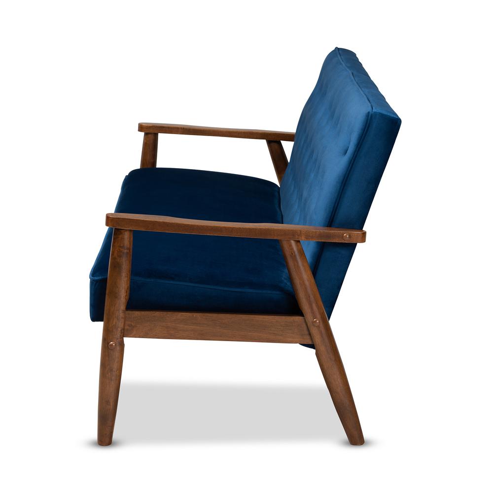 Baxton Studio Sorrento Mid-century Modern Navy Blue Velvet Fabric Upholstered Walnut Finished Wooden 3-seater Sofa. Picture 13