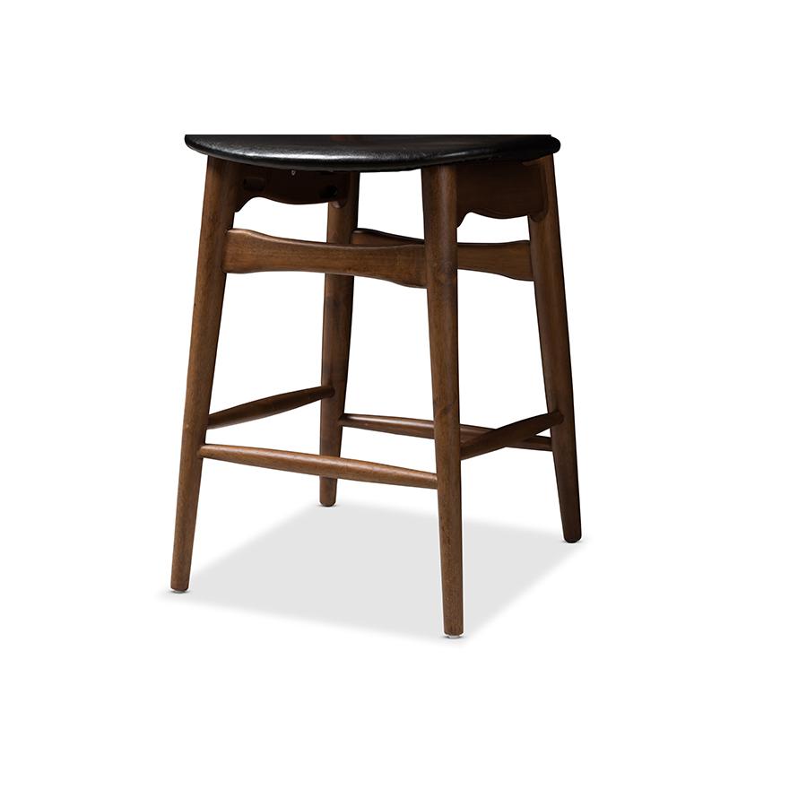 Flora Mid-Century Modern Black Faux Leather Upholstered Walnut Finished Counter Stool Set. Picture 6