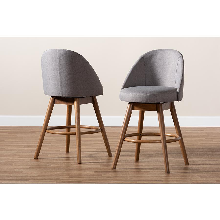 Baxton Studio Carra Mid-Century Modern Grey Fabric Upholstered Walnut-Finished Wood Swivel Counter Stool (Set of 2). Picture 1