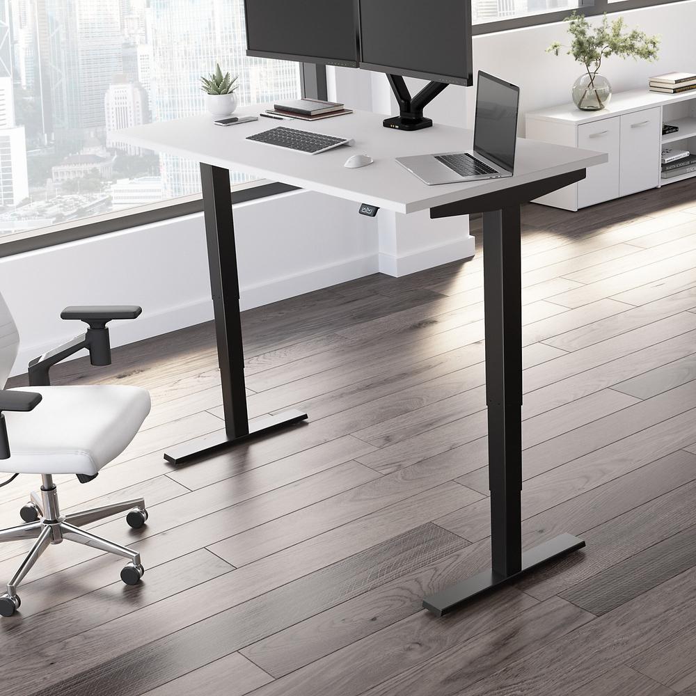 Move 40 Series by Bush Business Furniture 60W x 30D Electric Height Adjustable Standing Desk White/Black Powder Coat. Picture 2