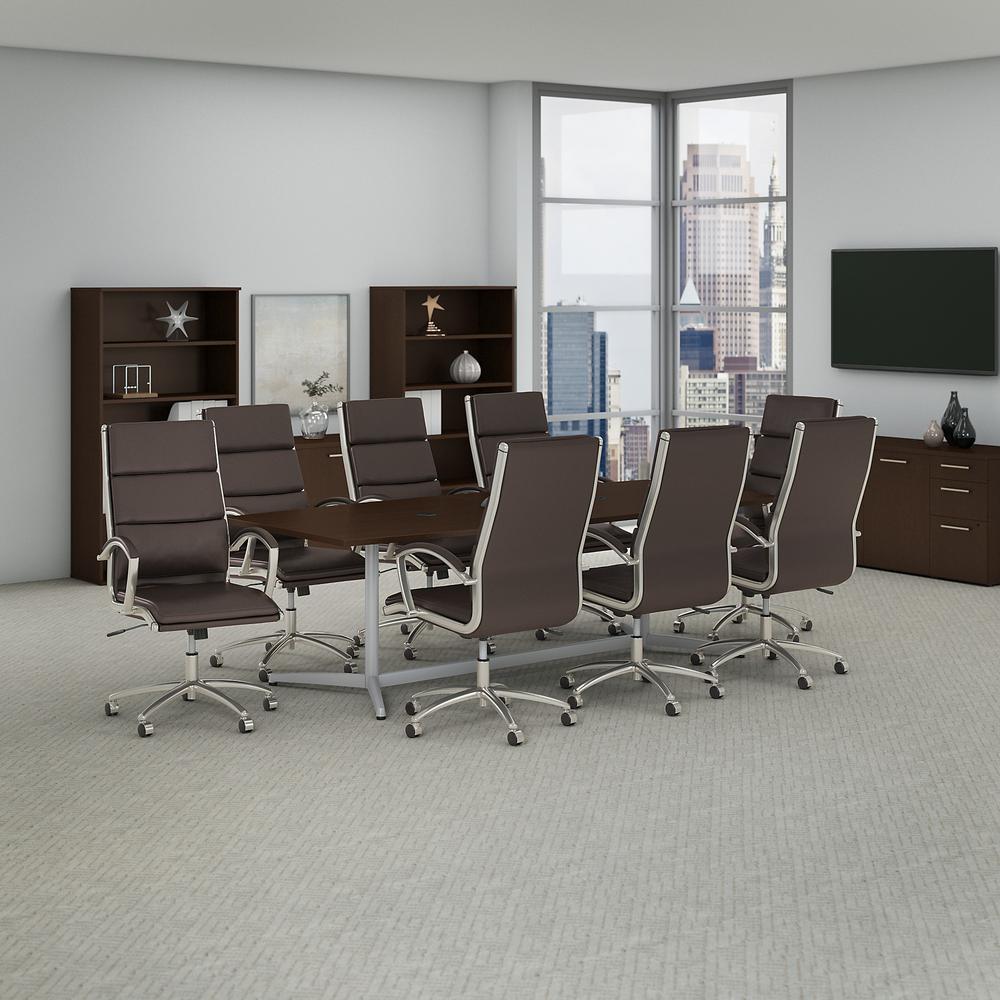 96W x 42D Boat Shaped Conference Table with Metal Base and Set of 8 High Back Office Chairs, Mocha Cherry. Picture 2