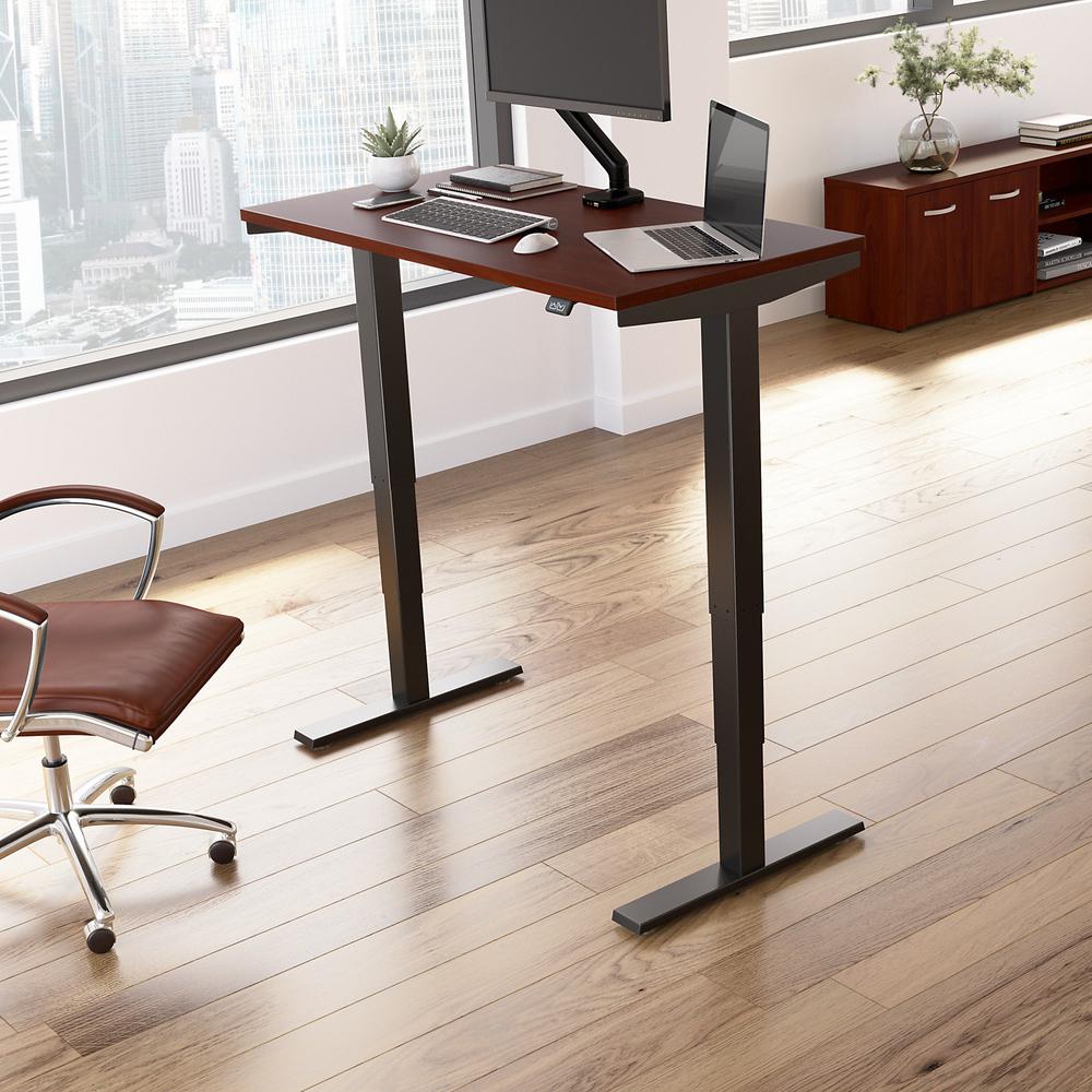 Move 40 Series by Bush Business Furniture 48W x 24D Electric Height Adjustable Standing Desk Hansen Cherry/Black Powder Coat. Picture 2