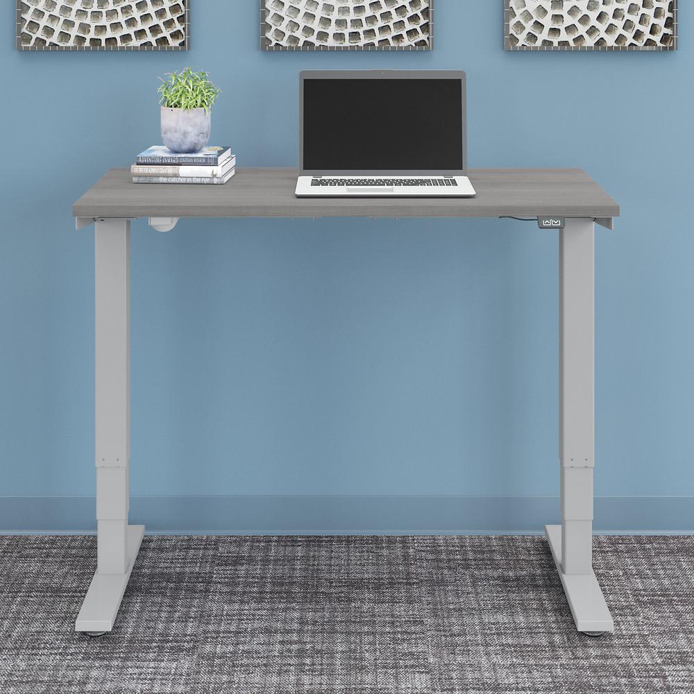 Move 40 Series by Bush Business Furniture 48W x 24D Electric Height Adjustable Standing Desk - Platinum Gray/Cool Gray Metallic. Picture 2