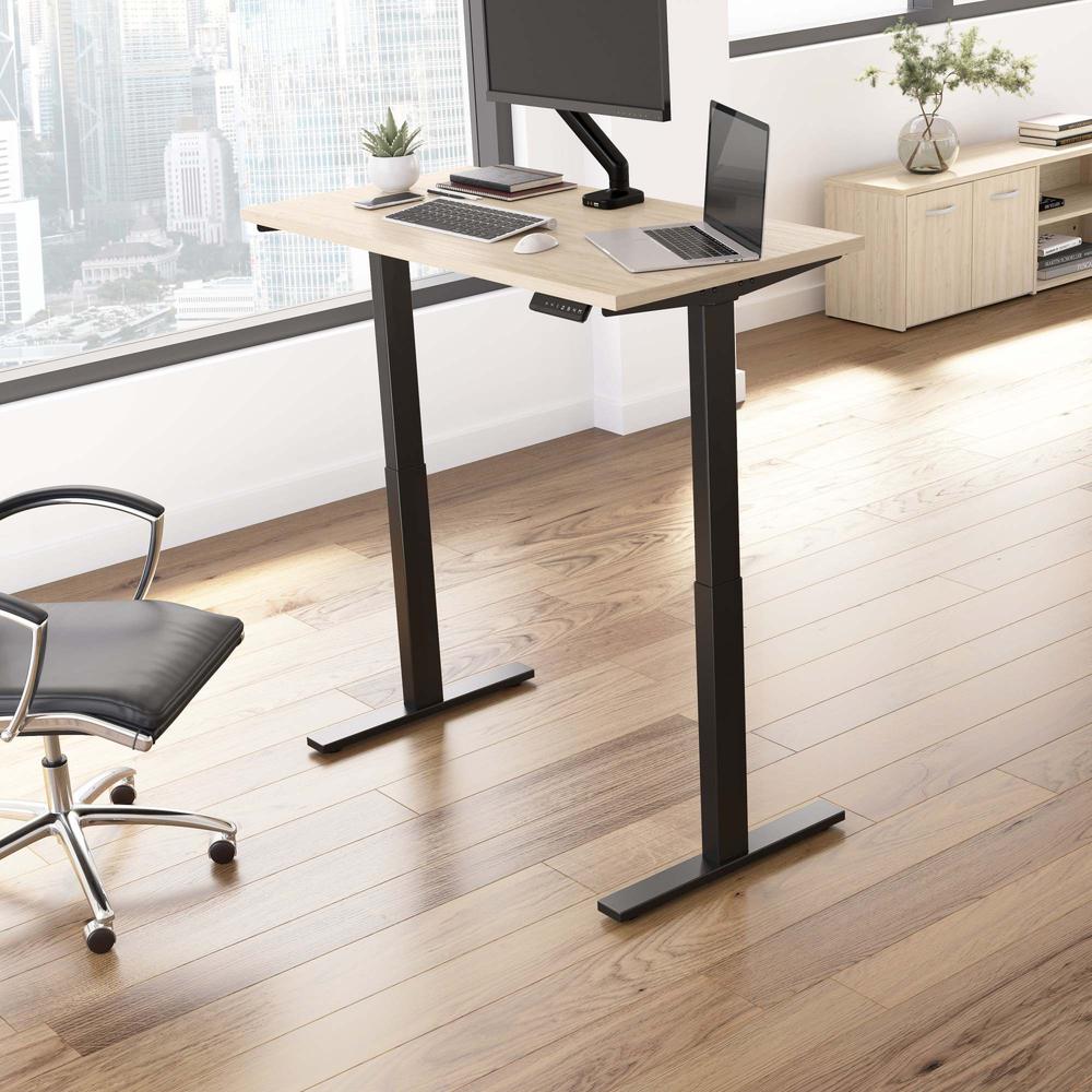 Electric Height Adjustable Standing Desk in Natural Elm with Black Base. Picture 8