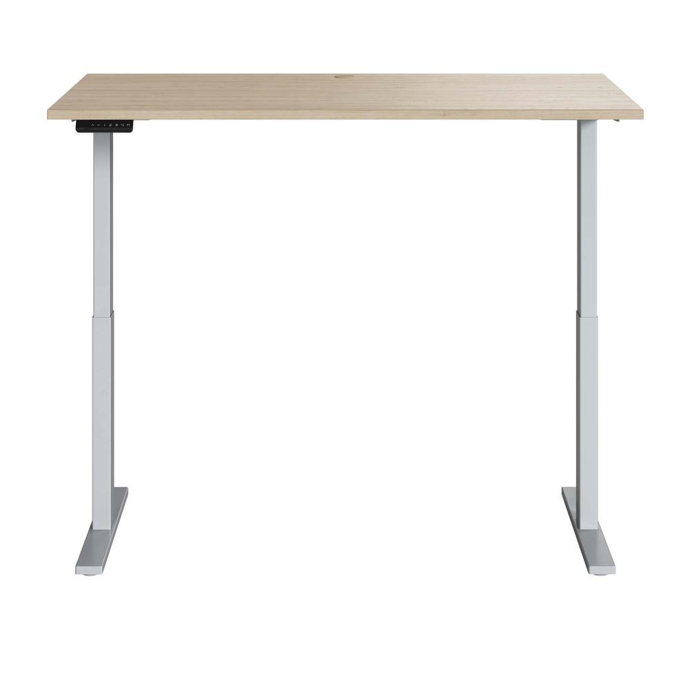 Electric Height Adjustable Standing Desk in Natural Elm with Silver Base. Picture 1