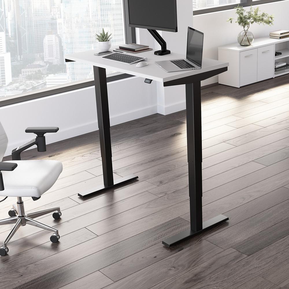 Move 40 Series by Bush Business Furniture 48W x 24D Electric Height Adjustable Standing Desk White/Black Powder Coat. Picture 2
