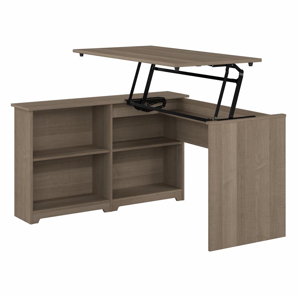 Bush Furniture Cabot 52W 3 Position Sit to Stand Corner Desk with Shelves, Ash Gray. Picture 1