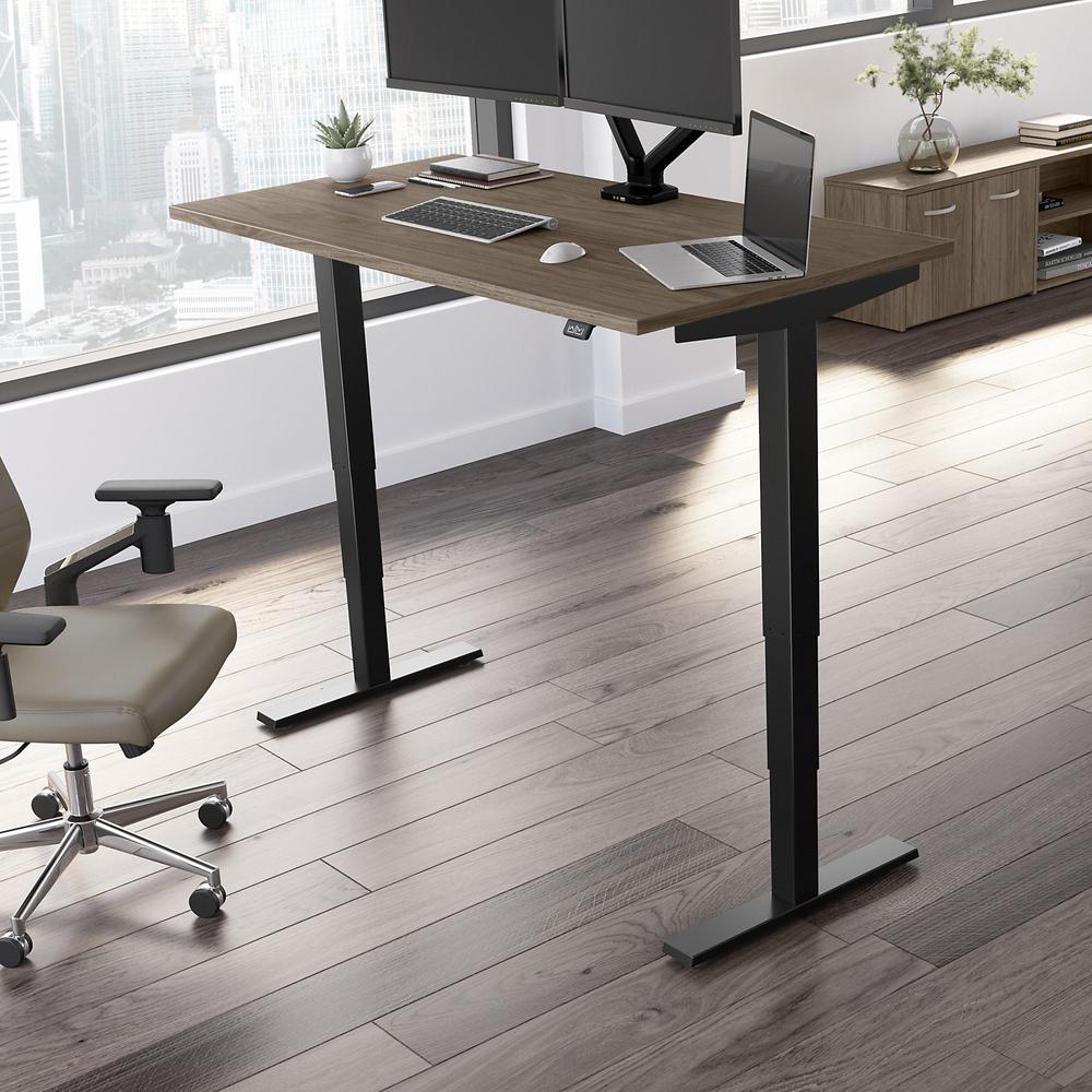 Move 40 Series by Bush Business Furniture 60W x 30D Electric Height Adjustable Standing Desk Modern Hickory/Black Powder Coat. Picture 2