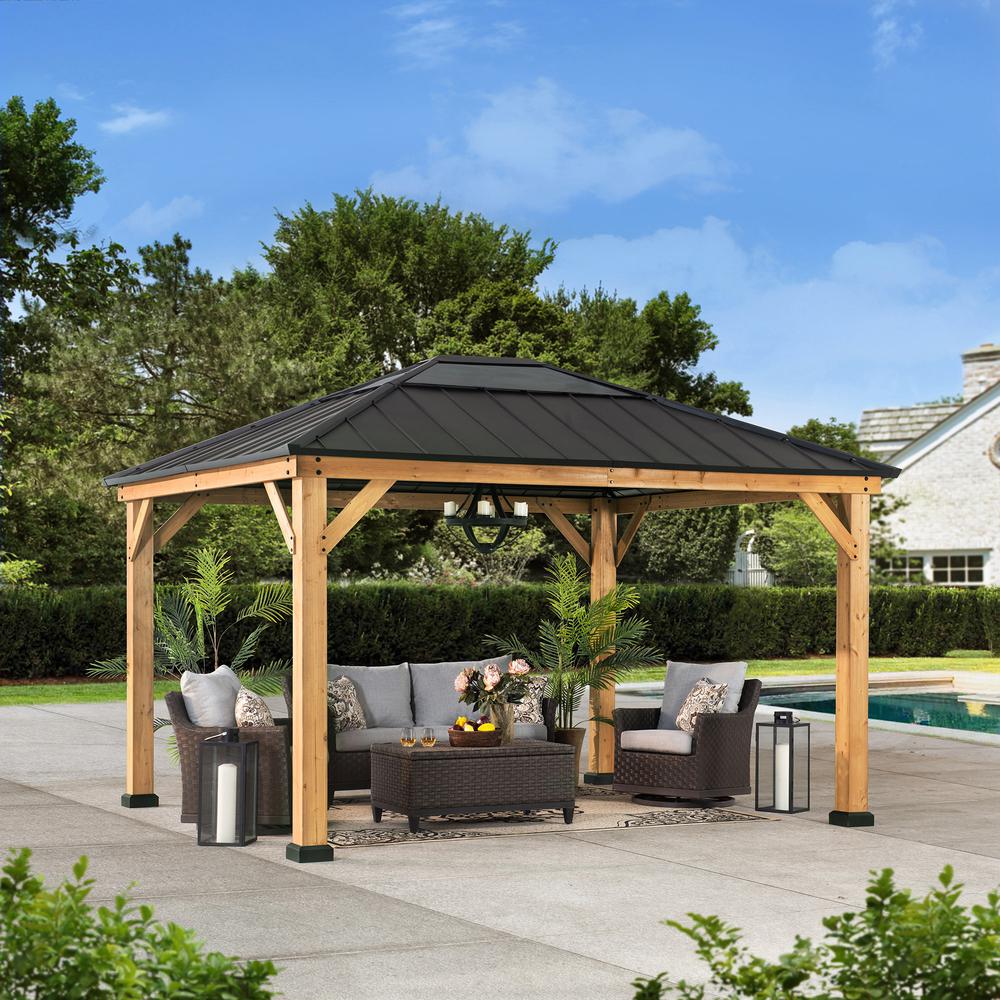 Sunjoy 11 ft. x 13 ft. Cedar Framed Gazebo with Black Steel and Polycarbonate Hip Roof Hard Top. Picture 9
