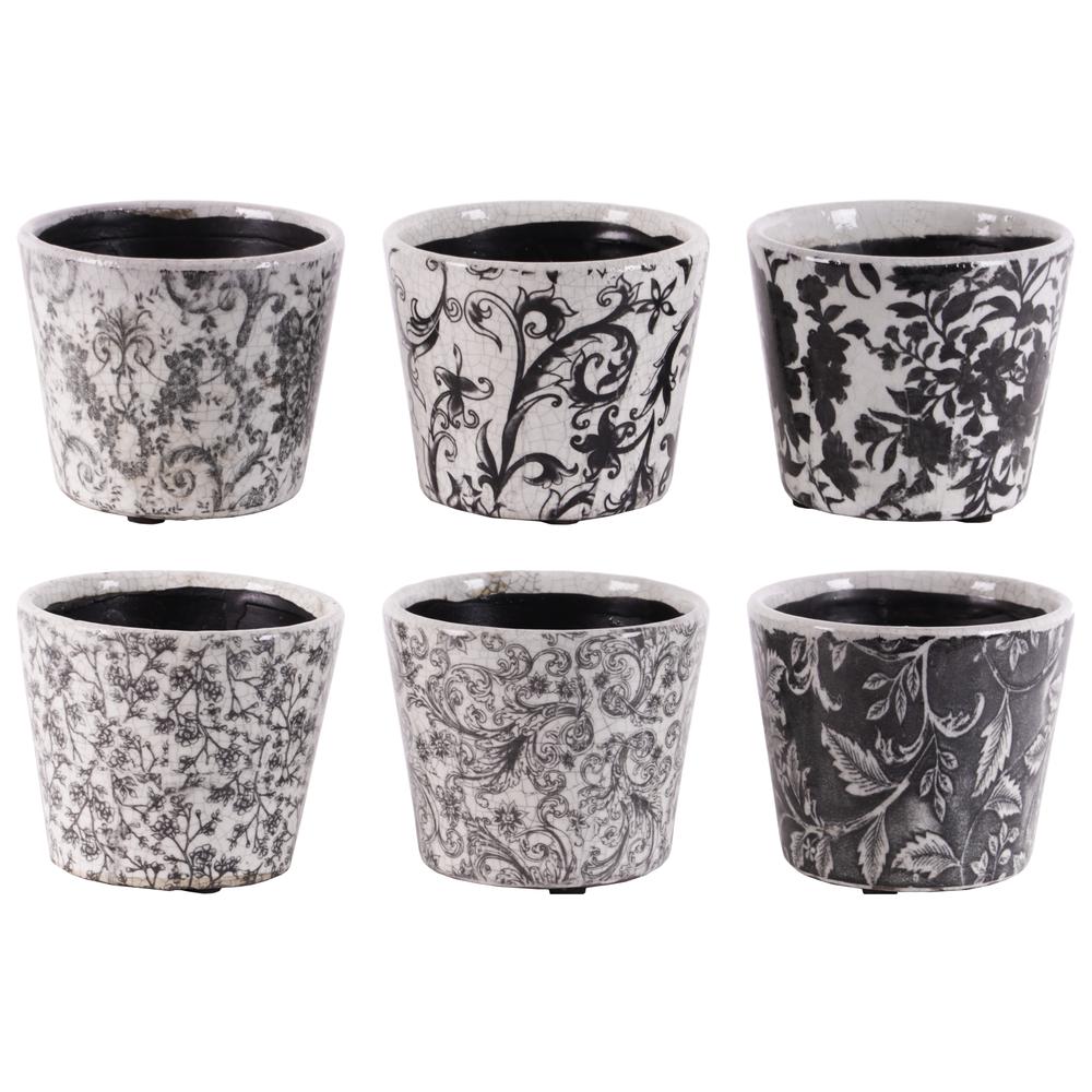 Terracotta Round Pot with Floral Design Body and Tapered Bottom Assortment of Six Craquelure Gloss Finish Black and White. The main picture.